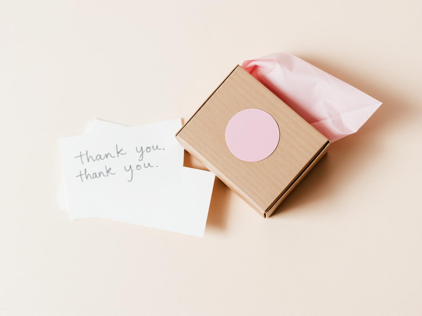 Handmade order packed in a kraft box with tissue and a thank-you card